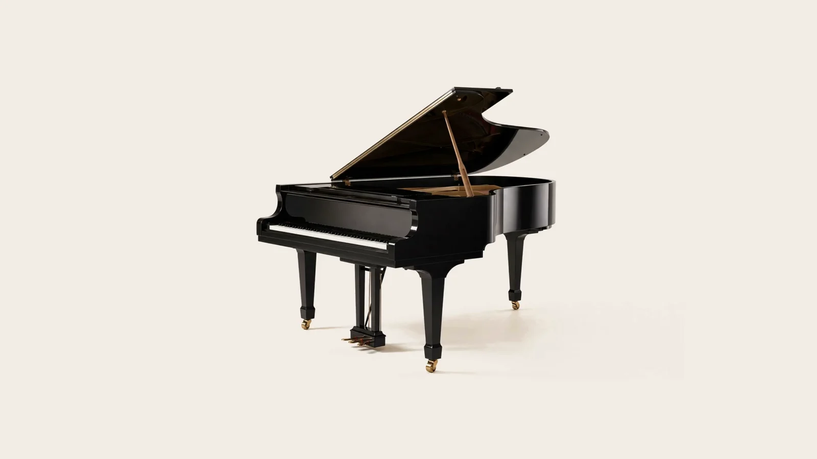 Black grand piano in an ivory studio